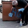 Removing Graffiti from Dumpster with Tagaway